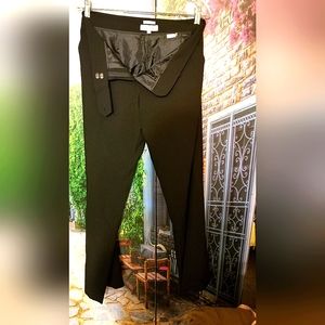 Calvin Klein straight leg Pants. Black with pockets zippered strap on waist.